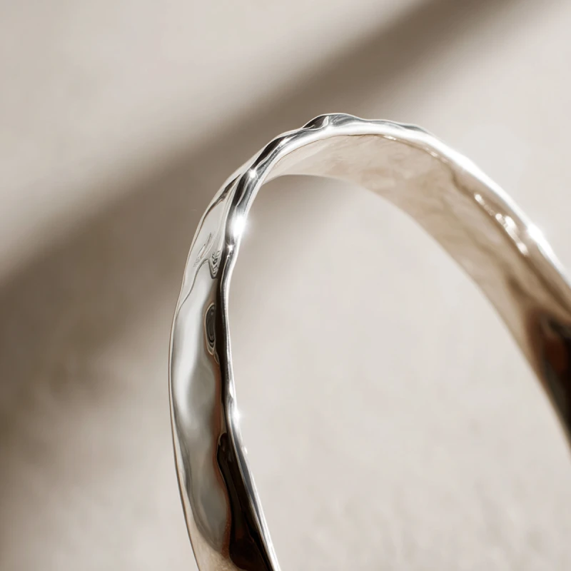 20251007_1713_Silver Bracelet Elegance_remix_01k6zknjakefav6567bhg7vsn4 3.png